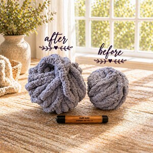 May include: Two balls of light gray chunky yarn, one significantly larger than the other, labeled with the words after and before. A wooden tool with black ends and the text FLUFF-N-EZ INSPIRED-BY-YOU LLC is positioned in front of the yarn.