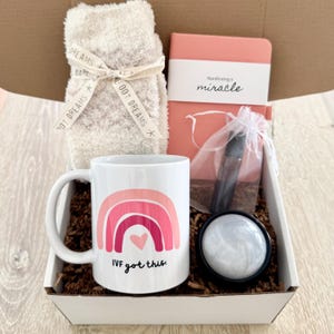IVF Fertility Care Package of Intentional Gifts including Cozy Socks, Affirmation Mug, Essential Oil Roller, Manifesting Journal, & Massager