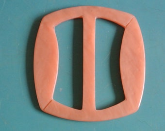 Vintage 1960s unused almost rectangular salmon pink plastic buckle for your sewing prodjects