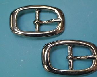 Lot of 2 strong unused vintage 1960s smaller nearly oval silvercolor metal belt buckle for your sewing prodjects