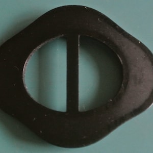 Larger vintage 1940s unused irregular black plastic buckle for your sewing prodject
