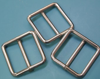 Lot of 8 vintage 1960s unused silvercolor metal buckles for your sewing prodjects