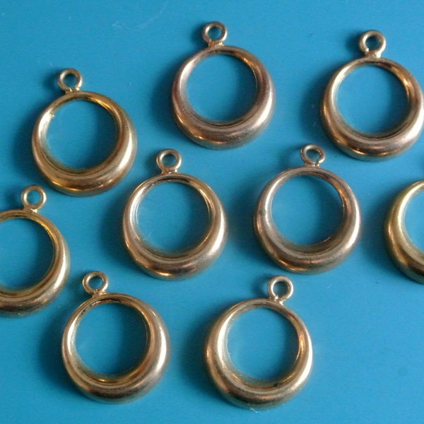 Lot of 9 vintage 1980s unused round goldcolor metal ring charms with loop for use in jewelry prodjects