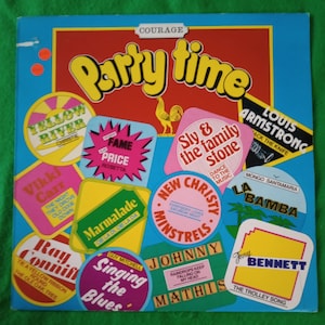 May include: A vintage vinyl record album cover titled "Party Time" with a blue background and various colorful stickers featuring artist names like Louis Armstrong and Johnny Mathis. The album art has a retro aesthetic.