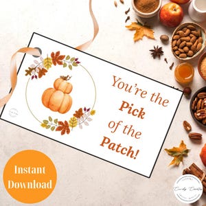 May include: A white card with the text "You're the Pick of the Patch!" and a watercolour illustration of two stacked pumpkins. The card is decorated with a wreath of autumn leaves and an orange circle with the words "Instant Download".