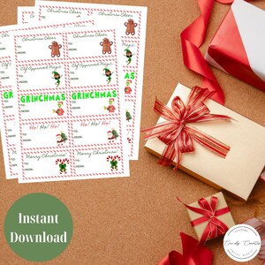 May include: Sheets of Christmas gift tags with various festive designs, including gingerbread men, elves, and Santa Claus. The tags feature phrases like "Christmas Cheer," "Grinchmas," and "Merry Christmas!" A gift box with a red ribbon is also visible.