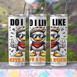 May include: Three white stainless steel tumblers with a cartoon duck wearing sunglasses and a red bandana. The tumblers have the text "Do I Like Give A Duck", "Do I Like Give A Duck", and "Like A Duck" on them.
