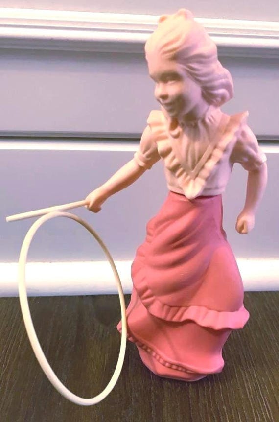 VINTAGE 1970's Avon Roll-a-hoop Girl Figurine Perfume Cologne With