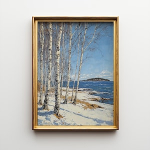 以下が含まれることがあります： 額縁に入った風景画。雪の積もった海岸線に沿って白樺の木々が描かれた冬の情景。青い空、水面、遠くには小さな島が描かれています。フレームは金色です。