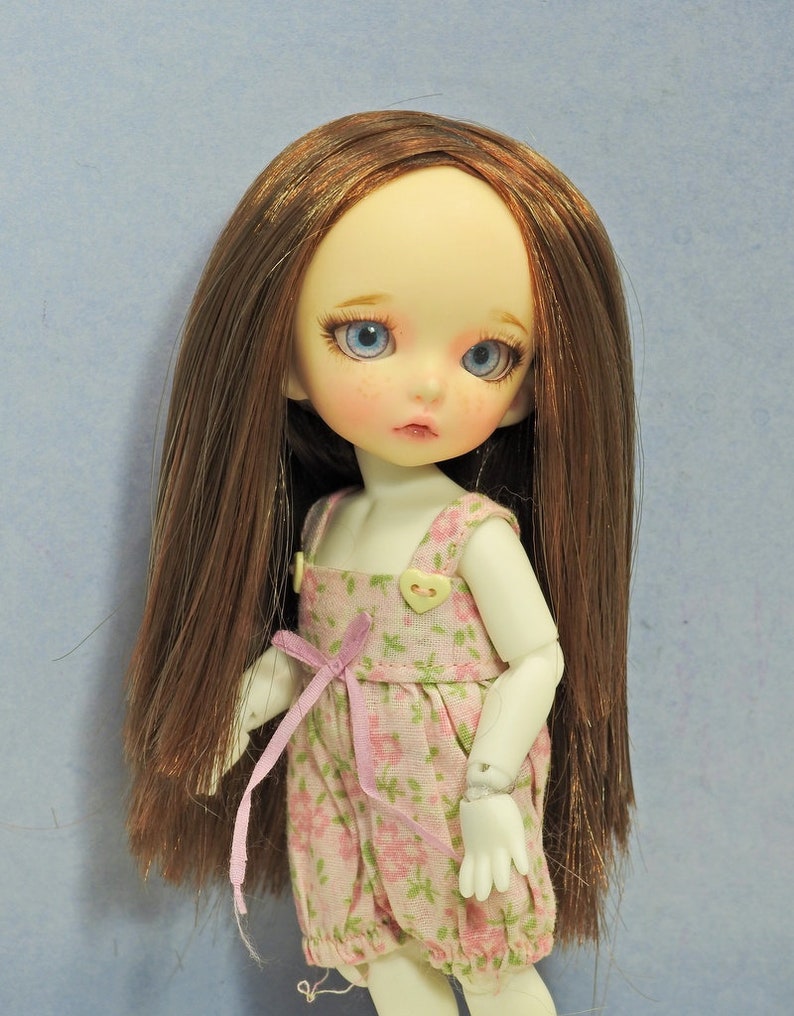 lati yellow doll
