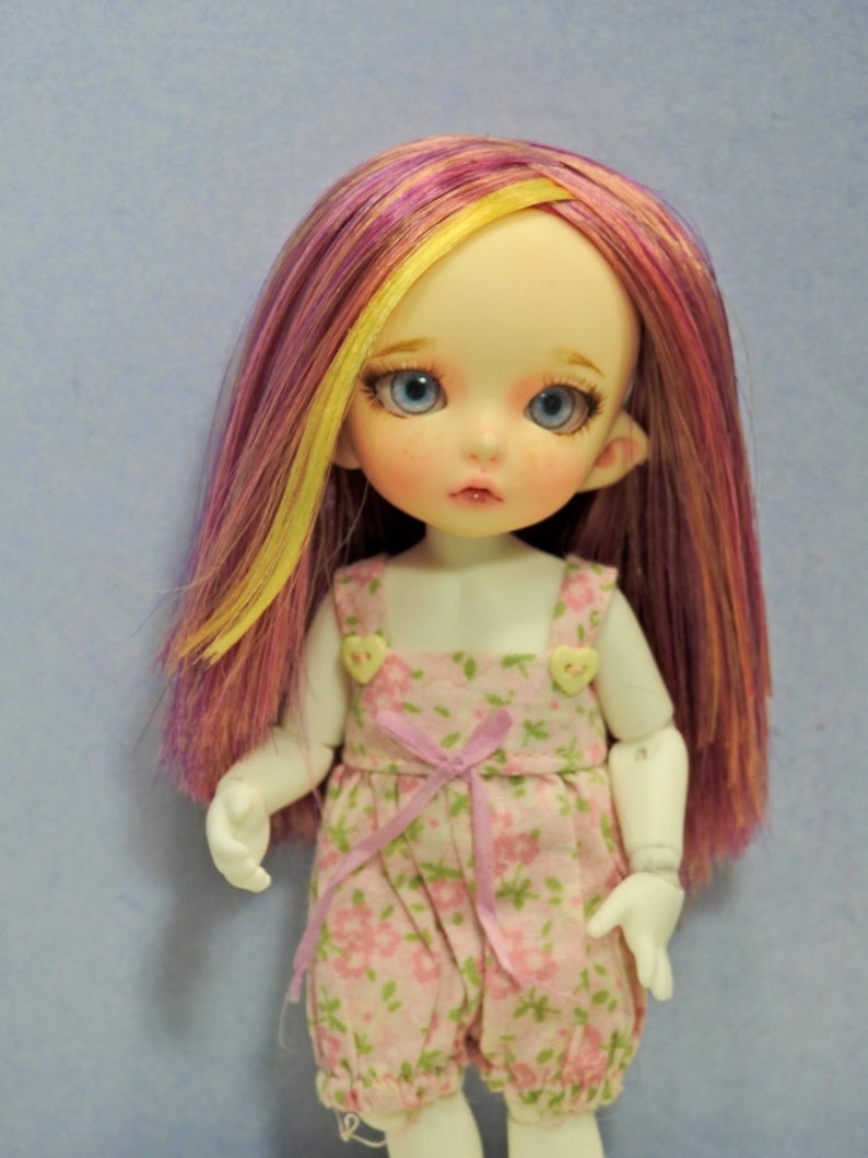 lati yellow doll