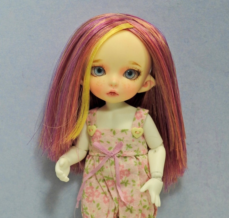 lati yellow doll