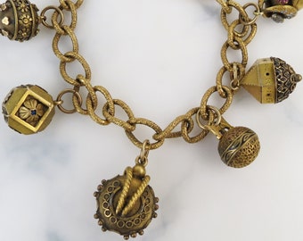 1880s Victorian gold filled Etruscan revival charm bracelet w/ 1 inch 18k gold loop end ,  enamel , paste gems , crescent moon , spheres