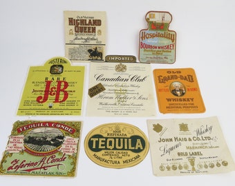 Lot of 8 liquor bottle labels including Whisky, Scotch, Bourbon & Tequila of varying vintage, shape, size and imagery