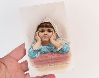 Victorian antique trade card advertising Hood's Tooth Powder with little blue-eyed girl