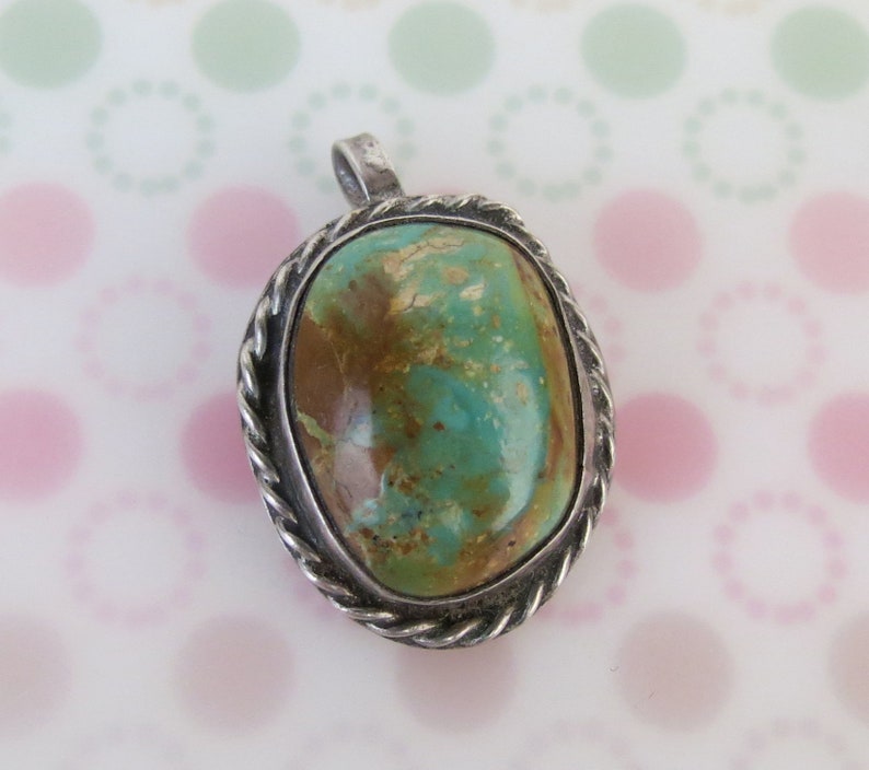 Vintage green brown turquoise sterling silver Navajo Native American pendant