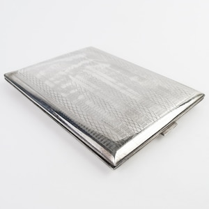 Vintage 1920s Art Deco sterling silver cigarette case with engraved patterns