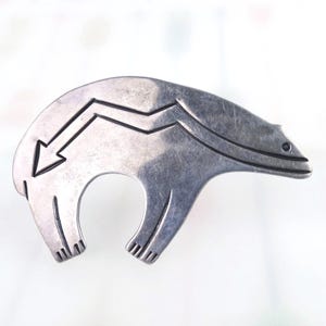 Vintage sterling silver Native American bear with heartline spirit animal brooch