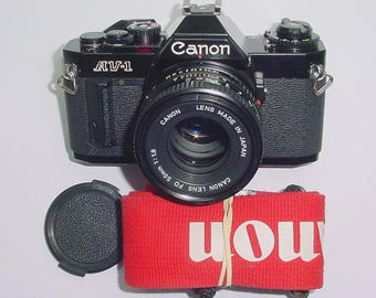 Canon AV-1 35mm Film SLR Manual Camera with Canon 50mm F/1.8 FD Lens in Black