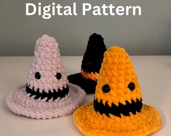 May include: Three crocheted Halloween witch hats in pink, black, and orange. Each hat has a black jagged mouth and black button eyes. The text "Digital Pattern" is at the top of the image.