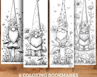 May include: Set of six black and white coloring bookmarks featuring whimsical gnome illustrations with floral and mushroom accents. Each bookmark measures 2 x 6 inches.