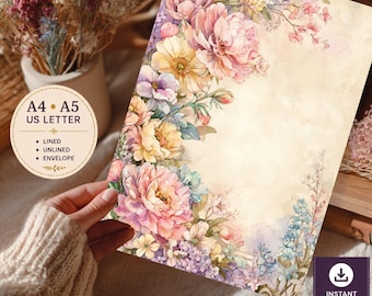Peut inclure: Une feuille de papeterie avec une bordure florale aquarelle composée de fleurs roses, jaunes et bleues sur fond crème. Un cercle affiche le texte A4, A5, US LETTER, LINED, UNLINED, ENVELOPE. Un badge indique INSTANT DOWNLOAD PDF + PNG.