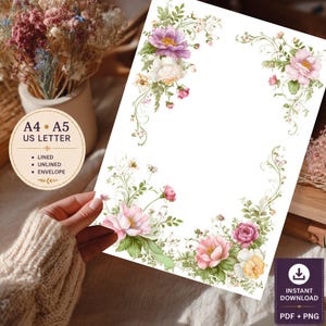 May include: A white stationery sheet featuring delicate watercolour floral arrangements in the corners, showcasing pink, white, and yellow blossoms with green foliage. The text on the sheet indicates A4, A5, and US Letter sizes, with options for lined, unlined, and envelope formats.