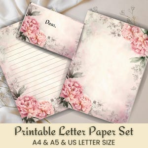 May include: A printable letter paper set featuring a soft pink and cream floral design with peonies. The set includes lined paper, blank paper, and an envelope. The text "Dear," is visible on the envelope. The set is labeled "Printable Letter Paper Set" with A4, A5, and US Letter sizes.