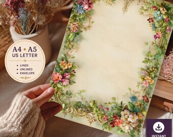Könnte beinhalten: Ein rechteckiges Briefpapier mit cremefarbenem Zentrum, umrahmt von bunten Blumen, grünen Blättern und goldenen Schnörkeln. Der Text links lautet A4, A5, US LETTER, LINED, UNLINED, ENVELOPE. Unten rechts steht INSTANT DOWNLOAD PDF + PNG.