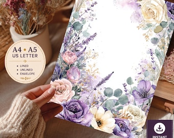 May include: A rectangular stationery sheet featuring a watercolor floral border with purple and cream roses, lavender sprigs, and eucalyptus leaves. A circular graphic displays the text A4, A5, US LETTER, LINED, UNLINED, ENVELOPE. A download icon is present.