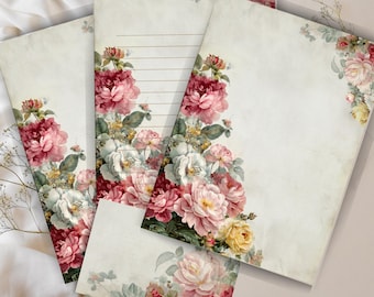 May include: A set of vintage-style stationery featuring a cream-colored background and floral accents. The stationery includes lined and unlined sheets, and a small card, all adorned with pink, red, and yellow roses.