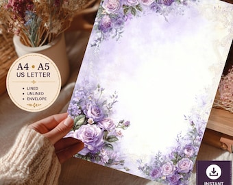 May include: A rectangular stationery sheet featuring a watercolor design of purple roses and floral accents in the corners. The center is white, surrounded by a soft lavender wash. Text on the sheet includes A4, A5, US LETTER, LINED, UNLINED, ENVELOPE, and INSTANT DOWNLOAD PDF + PNG.