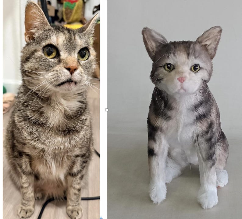 May include: A tabby cat with brown and gray stripes, sitting upright with a curious expression. The cat has yellow-green eyes and a pink nose. The cat's fur is detailed, and the overall appearance is lifelike.