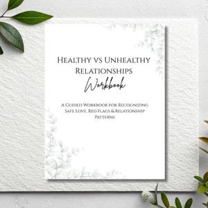 May include: A white workbook titled "Healthy vs Unhealthy Relationships" with the word "Workbook" in cursive. The workbook includes the text "A Guided Workbook for Recognizing Safe Love, Red Flags & Relationship Patterns."