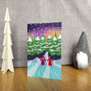 Schaatszussen kerstkaart