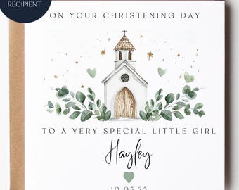 May include: A square white greeting card featuring a watercolor illustration of a small church with wooden doors, surrounded by green eucalyptus leaves, gold stars, and light green hearts. Text reads: ON YOUR CHRISTENING DAY TO A VERY SPECIAL LITTLE GIRL Hayley 10.05.25.