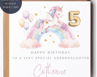 May include: A birthday card featuring a unicorn with a rainbow mane and tail, wings, and a golden horn, atop a rainbow. The card includes the number 5, balloons, stars, and the text "Happy Birthday to a very special granddaughter Catherine."