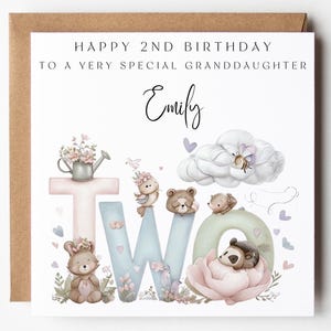 May include: A birthday card with a brown border and a white interior. The card reads "Happy 2nd Birthday to a Very Special Granddaughter Emily." The design includes the word "TWO" with floral and animal illustrations.