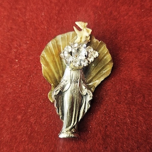 High occult amulet of the Darkened Mother Mary as demonic vessel and portal occult item haunted item metaphysical object psychic powers