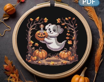 May include: A cross-stitch pattern featuring a cute ghost dog holding a jack-o'-lantern. The dog is surrounded by pumpkins and autumn leaves. The pattern is perfect for Halloween.