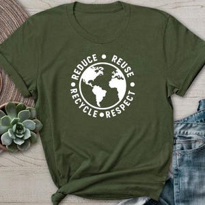 May include: A green t-shirt with a white graphic of the Earth and the words "Reduce, Reuse, Recycle, Respect".