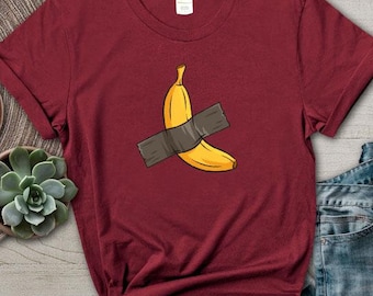 Funny Weird Banana Duct Taped to Wall Art T-Shirt Joke Tee 6.2 Million Sold Auction Parody