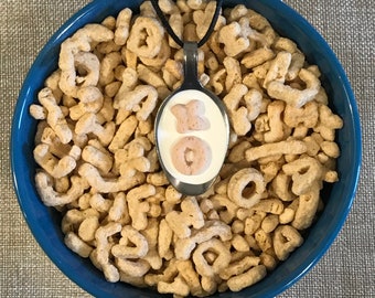 Abrazos y besos collar cuchara de cereales