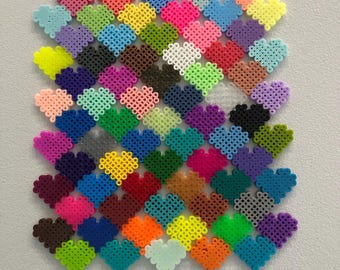 Arte con cuentas con diseño de corazón de píxeles