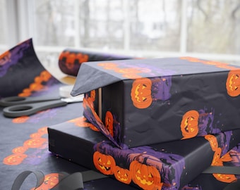 May include: Two wrapped gift boxes with black Halloween-themed wrapping paper featuring orange pumpkins and purple accents. A roll of matching paper, scissors, and a black ribbon are also visible, suggesting a festive holiday theme.