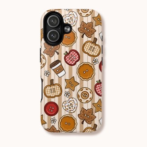 May include: A phone case featuring a repeating pattern of autumn-themed icons including pumpkins, maple leaves, apples, coffee cups, stars, and circular buttons against a background of vertical beige and white stripes with a black camera cutout.