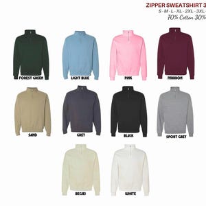 May include: A collection of zip-up sweatshirts in various colors, including forest green, light blue, pink, and maroon. The sweatshirts are available in sizes S-5XL and are made of 70% cotton and 30% polyester.