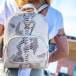 White Embossed Leather Backpack with Zipper and Wallet - Stylish and Functional
