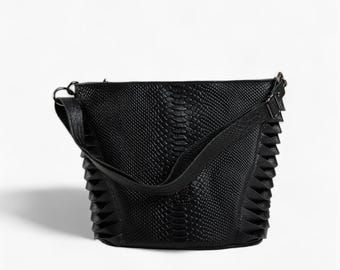 Classic Black Leather Shoulder Bag with Decorative Side Straps