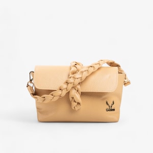 Powder Leather Bag with Braided Flap - A Stylish Touch of Elegance